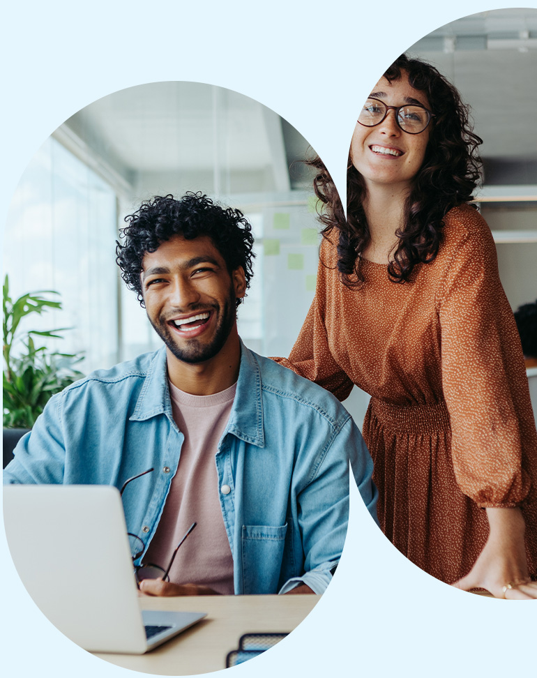 Colleagues walking through modern office