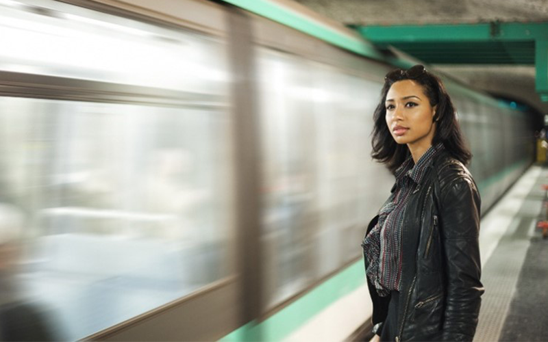 Woman waiting on subway platform