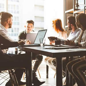 People meeting in a huddle-room