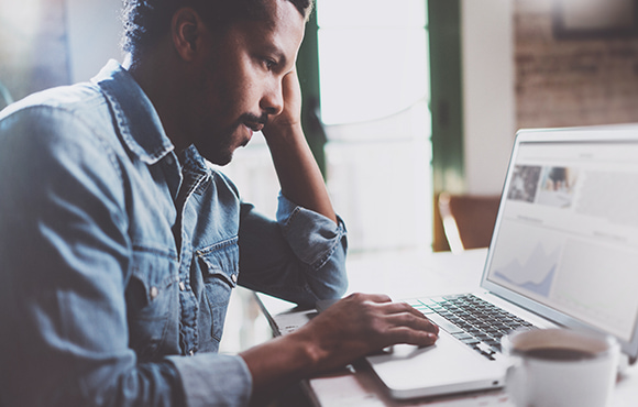 Man concentrating on his screen